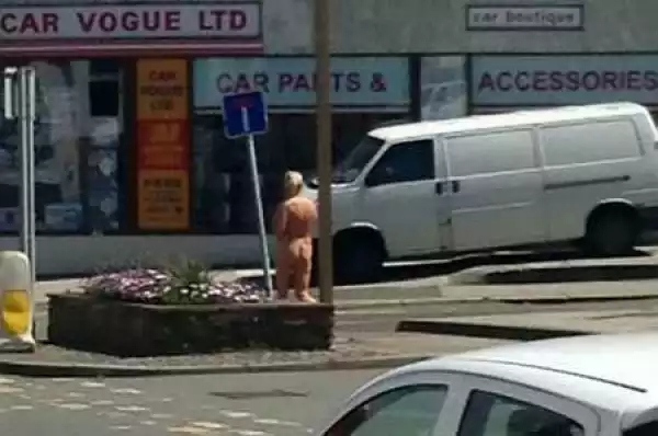 Drama as Completely N*ked Woman is Spotted Walking Through a Popular City Centre